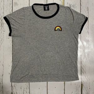 Gray shirt with a rainbow.